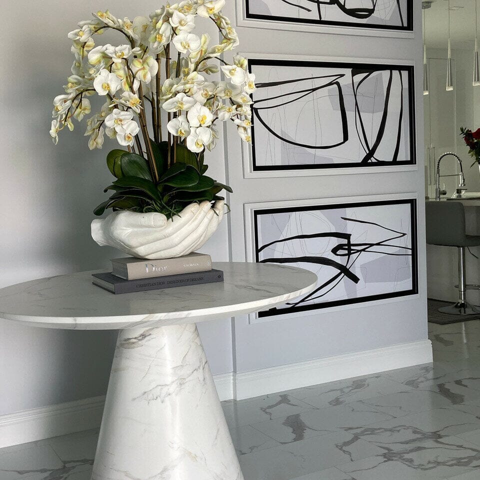 White Phalaenopsis Orchids in Vase with Sculpture "Open Hands" The New Garden