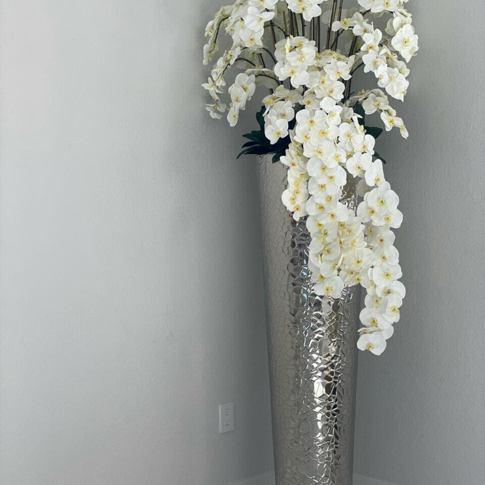 Cascading Phalaenopsis Orchids in Extra Tall Hammered Vase The New Garden 