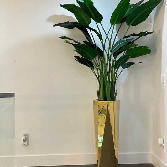 Golden prism vase with Bird of Paradise (7′) The New Garden 